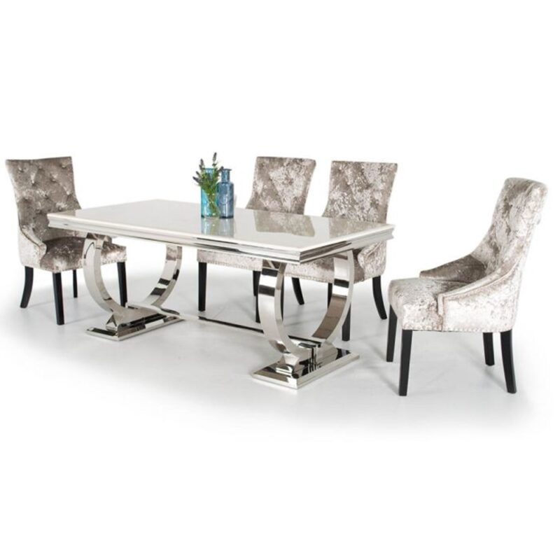 Luxury dining table with six chairs featuring modern stainless steel and a marble top, available for customization.