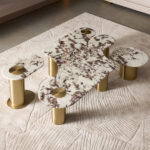 Contemporary Meraki Coffee Table with sleek metal frame and wooden top in modern living room setting