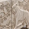 Aranya tiger carved console cabinet with raised forest and wildlife detailing