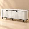 Arco Line curved white TV unit with arch-pattern front, black trim and gold-tipped legs