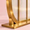 Arco Trio arched textured glass partition with Gold PVD frame