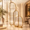 Arco Trio arched textured glass partition with Gold PVD frame