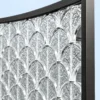 ArcScallop curved premix glass partition with textured scallop pattern