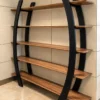 Arvento curved black retail display rack with five wooden-look shelves