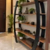 Arvento curved black retail display rack with five wooden-look shelves