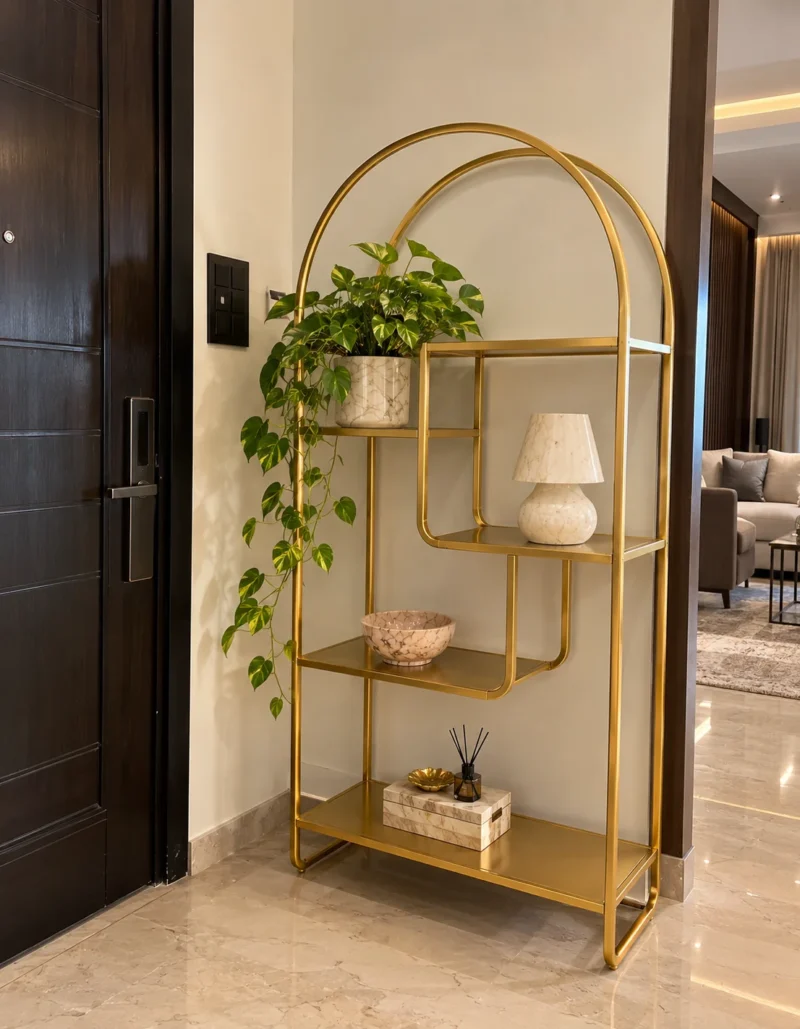 Aurelia Arc arched cosmetic display rack with gold frame and asymmetrical shelves