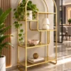 Aurelia Arc arched cosmetic display rack with gold frame and asymmetrical shelves