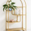 Aurelia Arc arched cosmetic display rack with gold frame and asymmetrical shelves