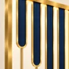 Aurelia blue and gold PVD partition with staggered blue inserts