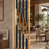 Aurelia blue and gold PVD partition with staggered blue inserts