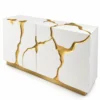 Aurelia Flow gold inlay console table with white cabinet storage and abstract gold detailing