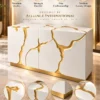 Aurelia Flow gold inlay console table with white cabinet storage and abstract gold detailing