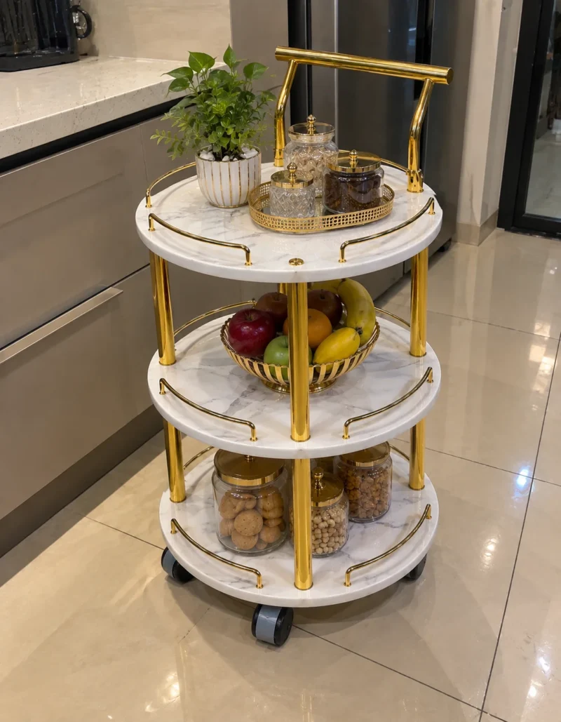 Aurelia Round marble serving trolley with white surfaces and gold frame