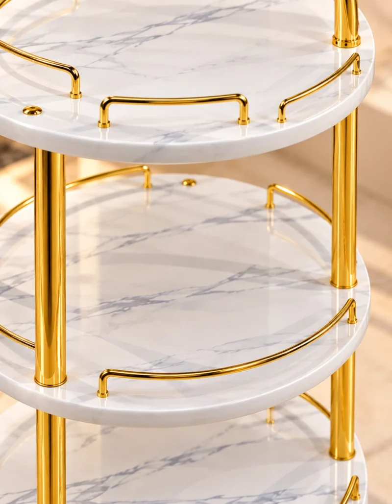 Aurelia Round marble serving trolley with white surfaces and gold frame