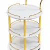 Aurelia Round marble serving trolley with white surfaces and gold frame