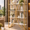 Aurevia curved frame cosmetic display rack with gold frame and white shelves