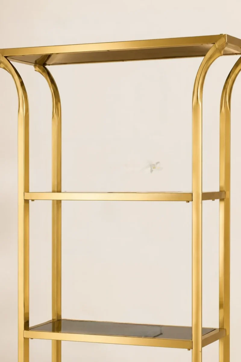 Aurevia Luxe gold multi tier display rack with open shelves and curved frame