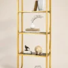 Aurevia Luxe gold multi tier display rack with open shelves and curved frame