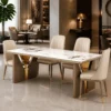 Aurevia Luxe luxury marble dining table with upholstered chairs and gold accent designer base