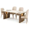 Aurevia Luxe luxury marble dining table with upholstered chairs and gold accent designer base