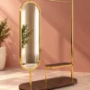 Aurevia standing mirror with clothes rack and gold stainless steel frame