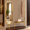 Aurevia standing mirror with clothes rack and gold stainless steel frame