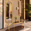 Aurevia standing mirror with clothes rack and gold stainless steel frame