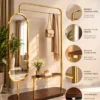 Aurevia standing mirror with clothes rack and gold stainless steel frame