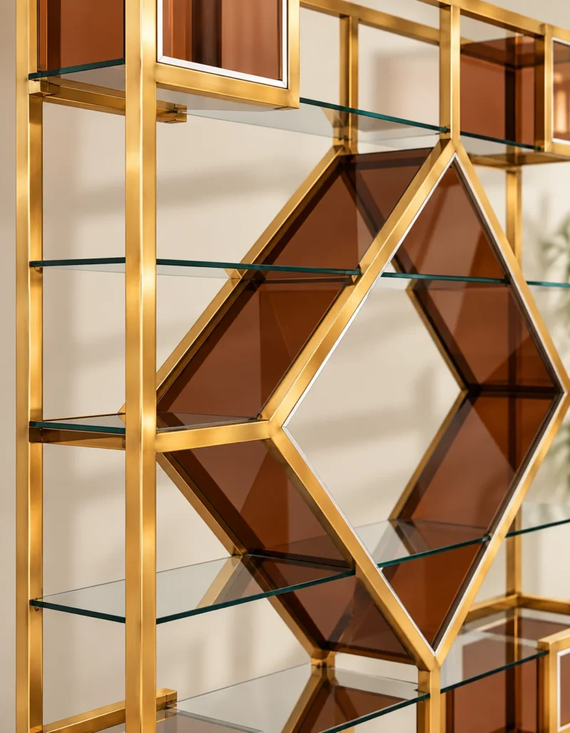 Aurex Geo geometric cosmetic display rack with gold frame and amber accents