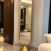 Aurex Geo geometric luxury standing mirror with gold stainless steel frame