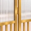 Aveline Arch three-panel fluted glass partition with gold frames and arched tops