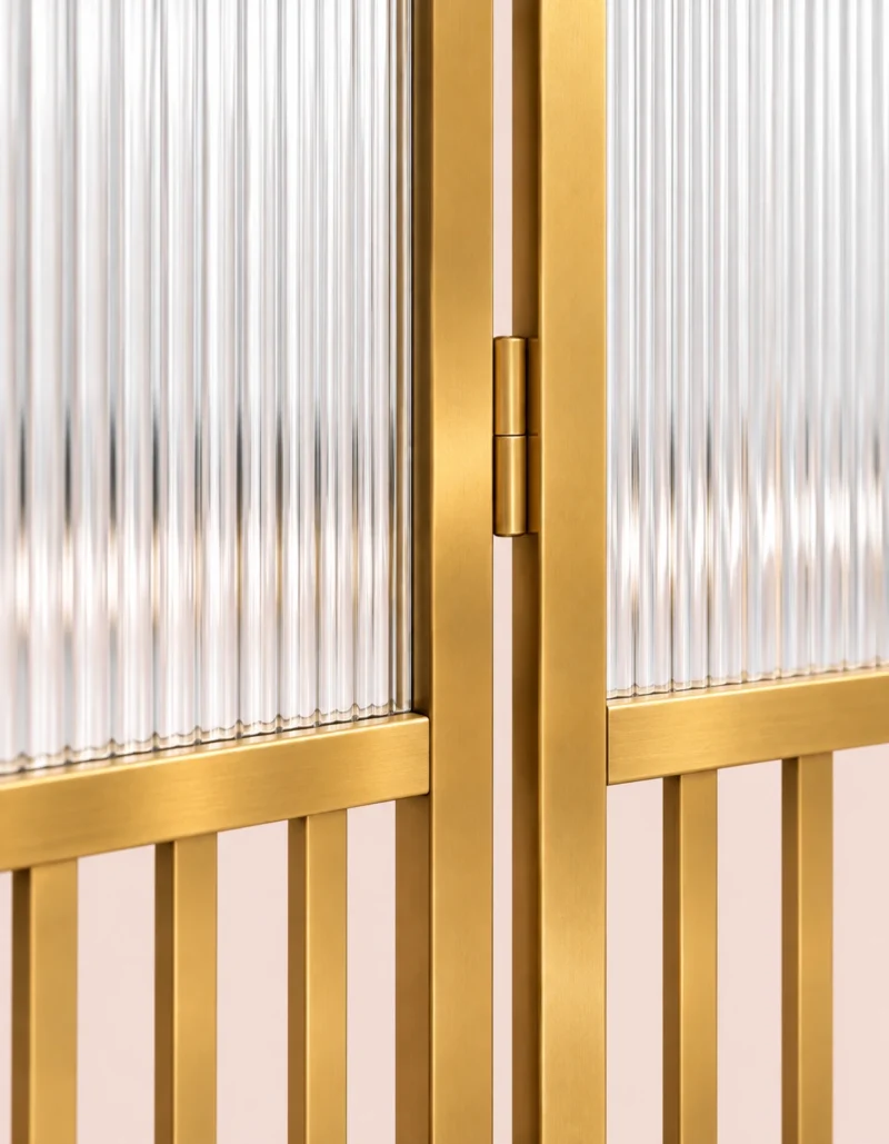 Aveline Arch three-panel fluted glass partition with gold frames and arched tops