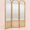 Aveline Arch three-panel fluted glass partition with gold frames and arched tops