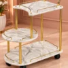 Avelora Luxe asymmetrical serving trolley with marble-look surfaces and gold frame