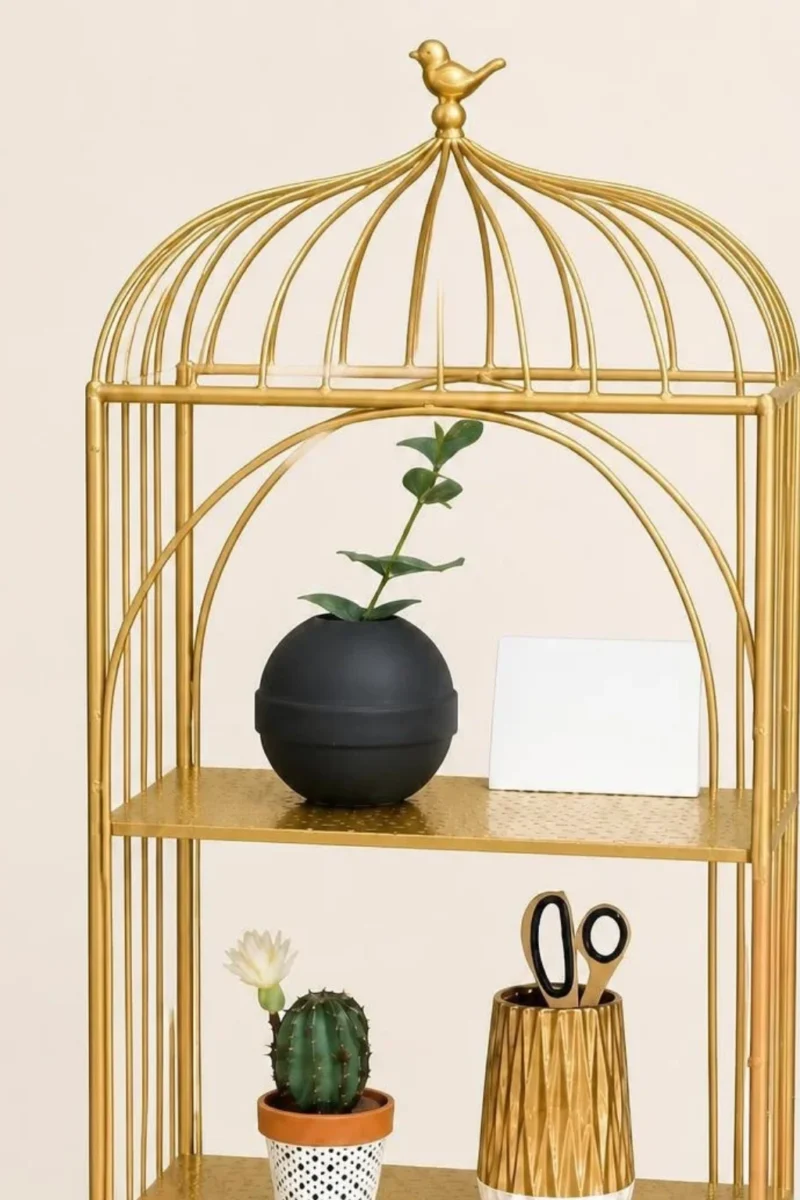 Aviora Luxe birdcage display rack with gold frame and multi-tier shelves