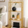Aviora Luxe birdcage display rack with gold frame and multi-tier shelves
