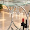 Celesta serving trolley with glass holder, bottle storage and silver frame
