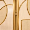 Cirque Luxe folding textured glass partition with gold frame