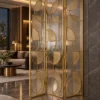 Cirque Luxe folding textured glass partition with gold frame