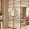 Clover Luxe textured glass partition with Gold PVD frame