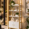 Elara Arch Luxe arched cosmetic display cabinet with gold frame and lower storage
