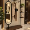 Elvara standing mirror with garment rack and shelves in black stainless steel frame