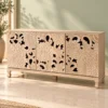 Florina floral carved console table with three decorative front panels and a light natural finish
