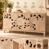 Florina floral carved console table with three decorative front panels and a light natural finish