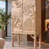 Forest Song two-door wooden cabinet with raised tree and bird carving