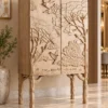 Forest Song two-door wooden cabinet with raised tree and bird carving