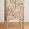 Forest Song two-door wooden cabinet with raised tree and bird carvingForest Song two-door wooden cabinet with raised tree and bird carvingForest Song two-door wooden cabinet with raised tree and bird carvingForest Song two-door wooden cabinet with raised tree and bird carving