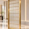 Linea Diamond vertical premix glass partition with Gold PVD detailing