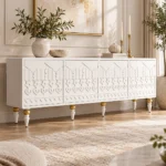 Liora Carve white TV unit with four patterned doors and gold-tone leg accents