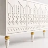 Liora Carve white TV unit with four patterned doors and gold-tone leg accents